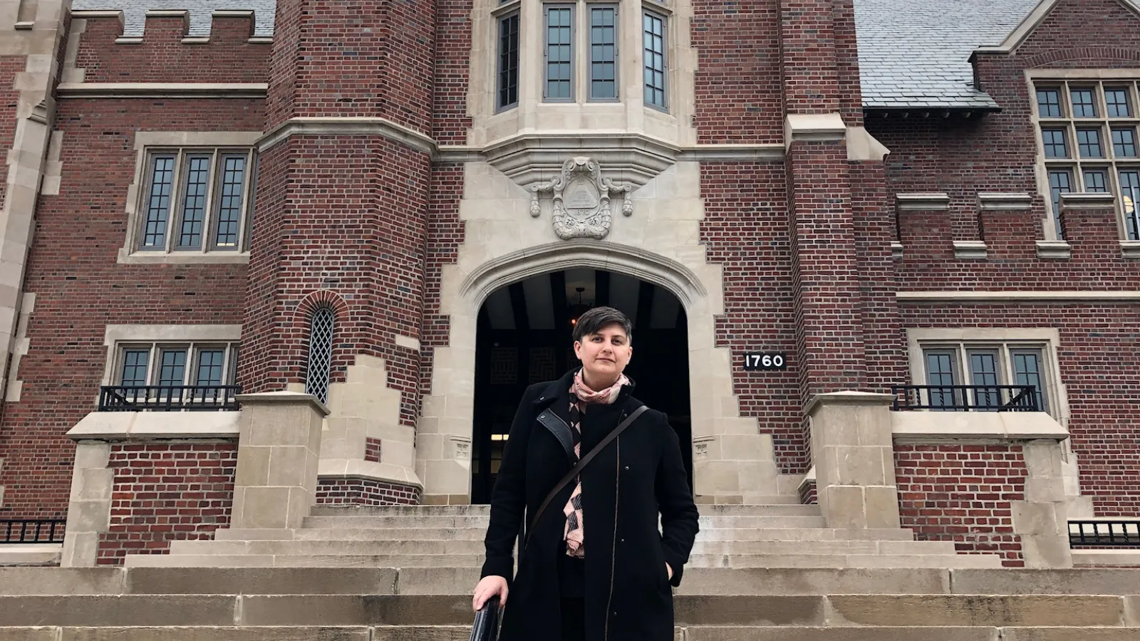 Alanna Radlo-Dzur standing in front of Pomerene Hall