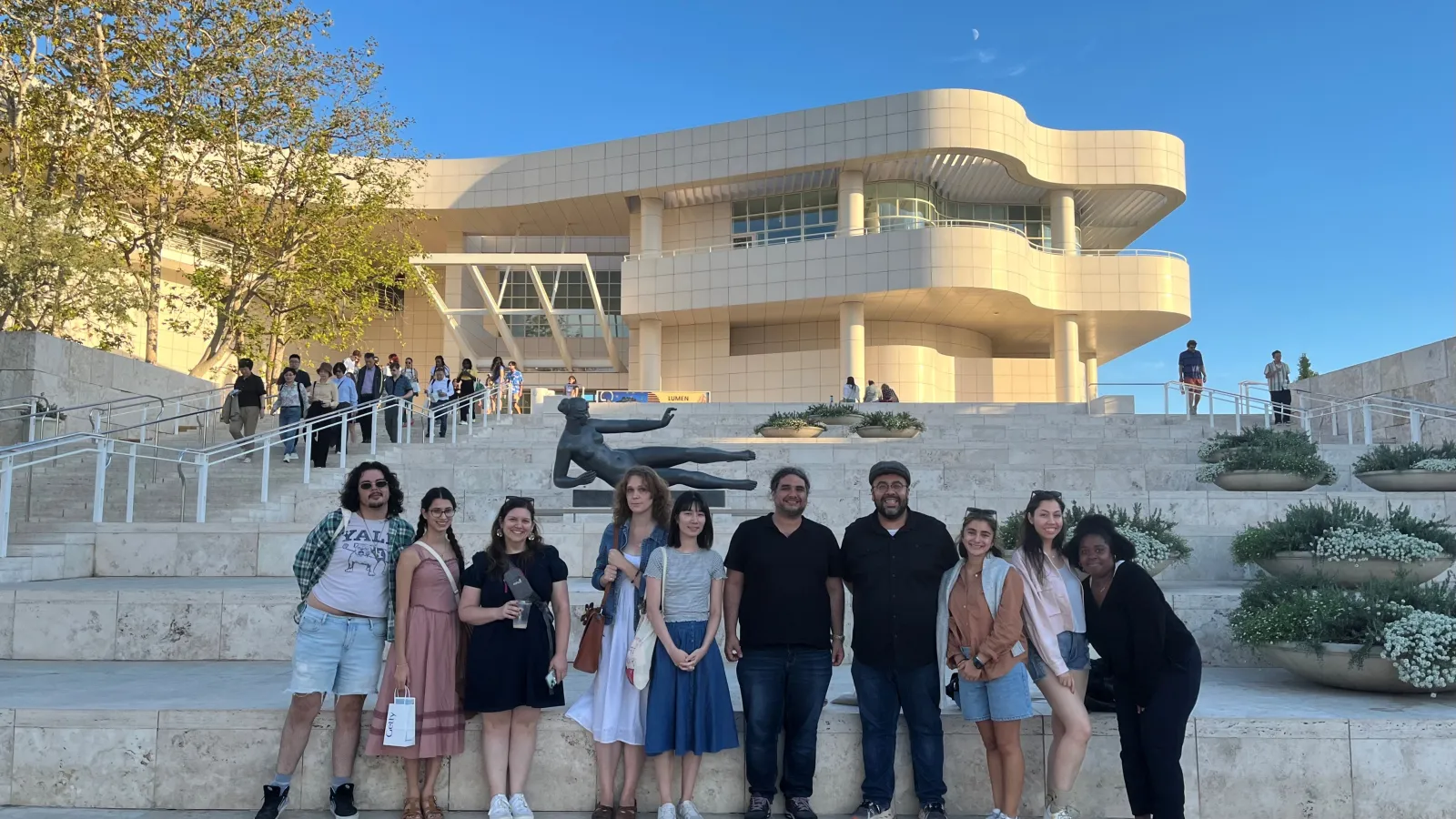 Group of people in front of large outdoor steps