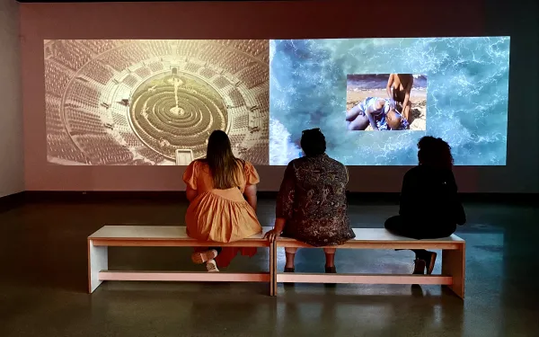 students looking at art in a museum