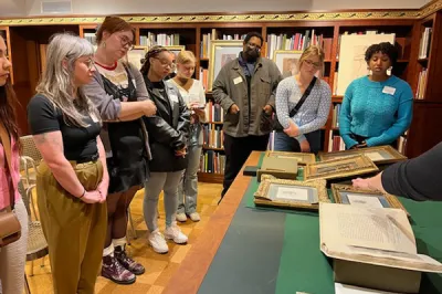 History of Art students examining works in the Morgan Library and Museum in New York
