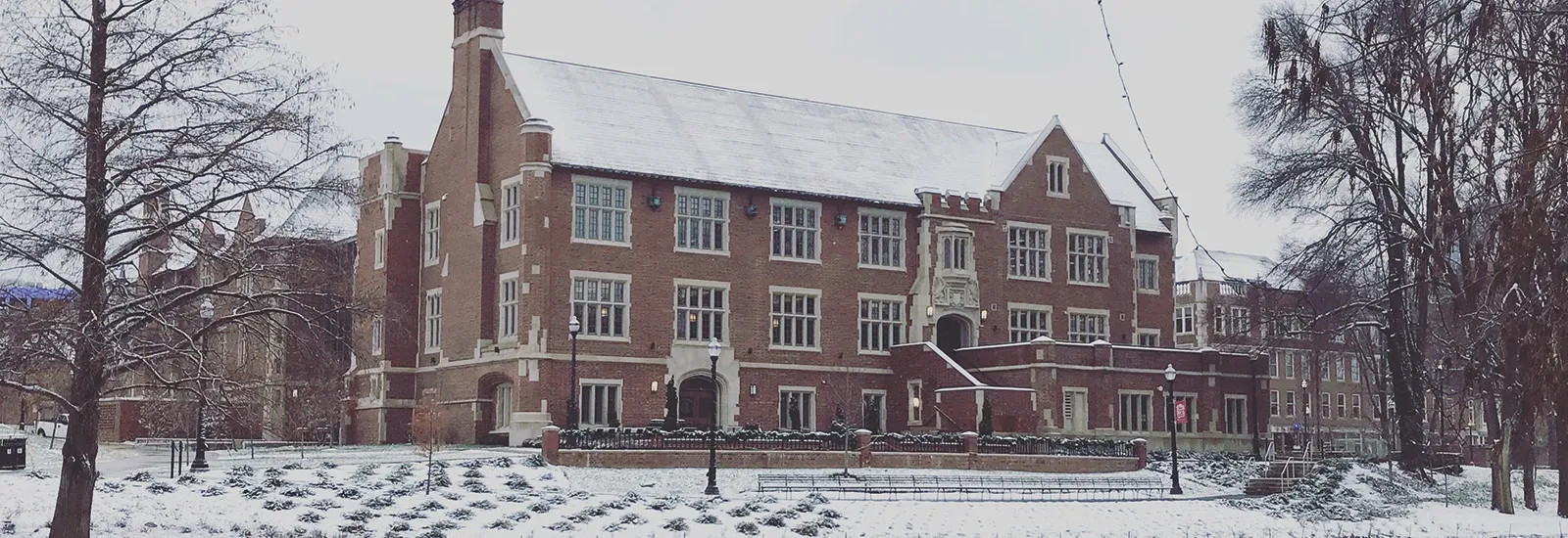 Pomerene Hall, home of the History of Art Department, viewed on a winter's day with Mirror Lake in the foreground
